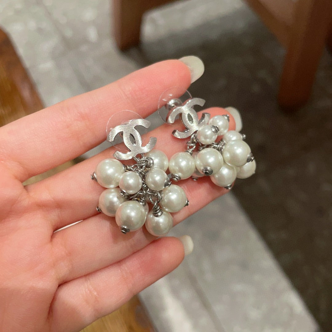 Martin Graham earrings in polished metal-tone – side detail
