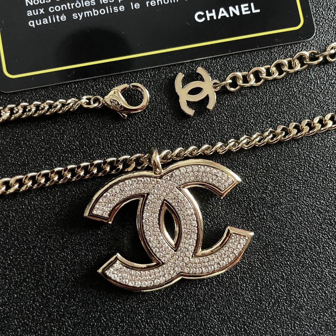 Martin Graham pendant necklace in polished metal-tone – detail view