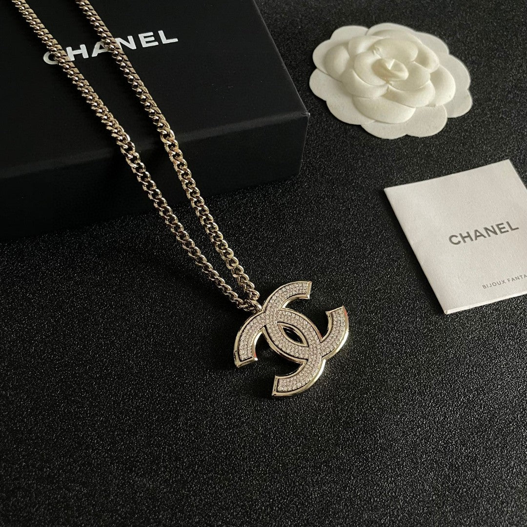 Martin Graham pendant necklace in polished metal-tone – front product view