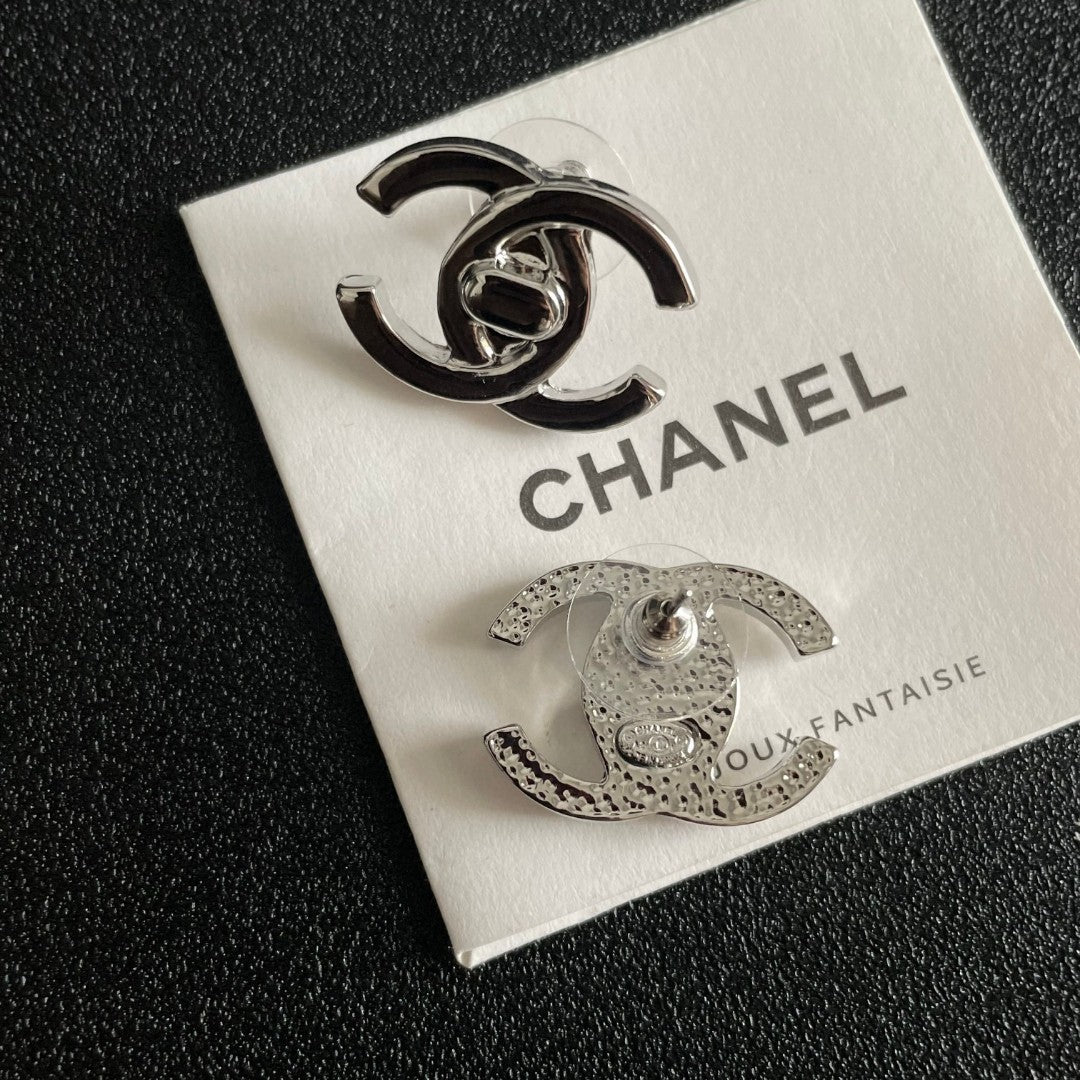 Martin Graham stud earrings in polished metal-tone – main product view
