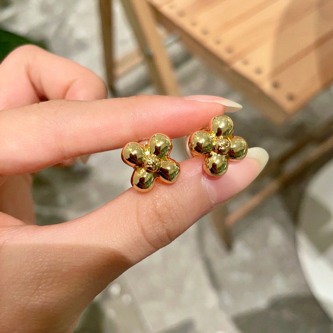 Martin Graham stud earrings in polished metal-tone – side detail