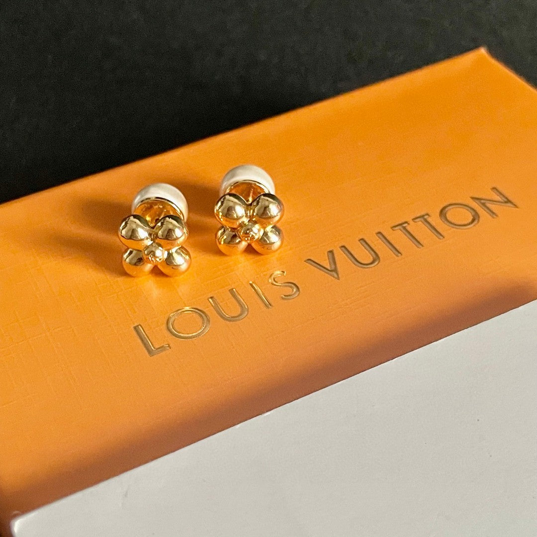Martin Graham stud earrings in polished metal-tone – detail view