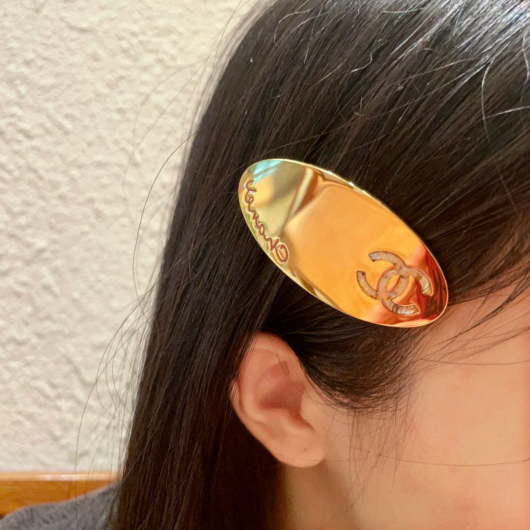 Martin Graham Double-C hair accessory in polished metal-tone – front product view
