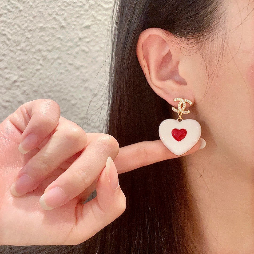 Martin Graham earrings in polished metal-tone – front product view