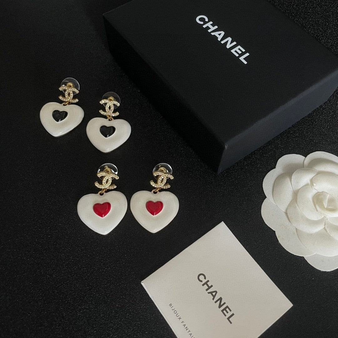 Martin Graham earrings in polished metal-tone – close-up detail