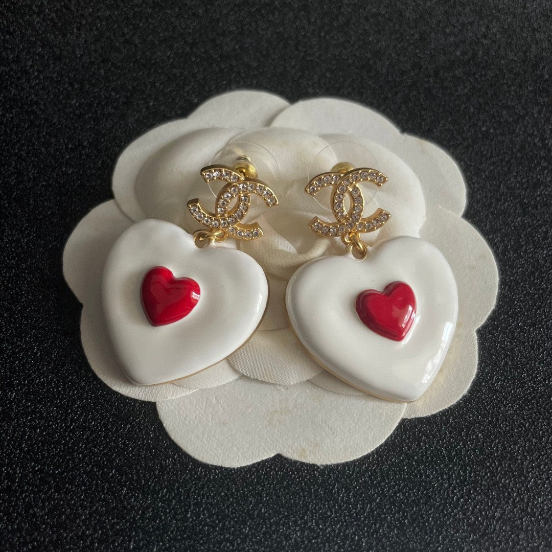 Martin Graham earrings in polished metal-tone – front product view