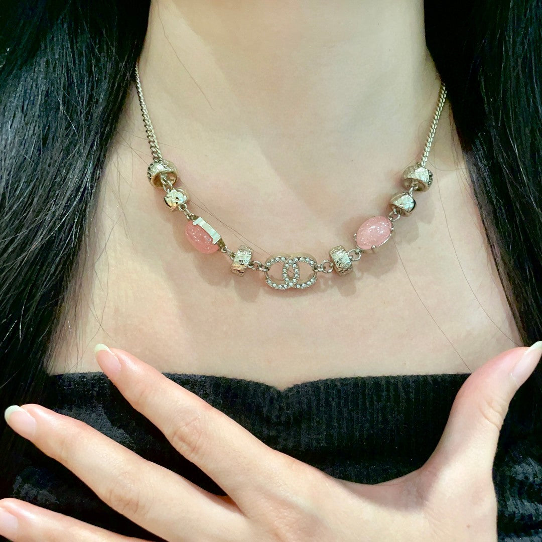 Martin Graham pendant necklace in polished metal-tone – side detail