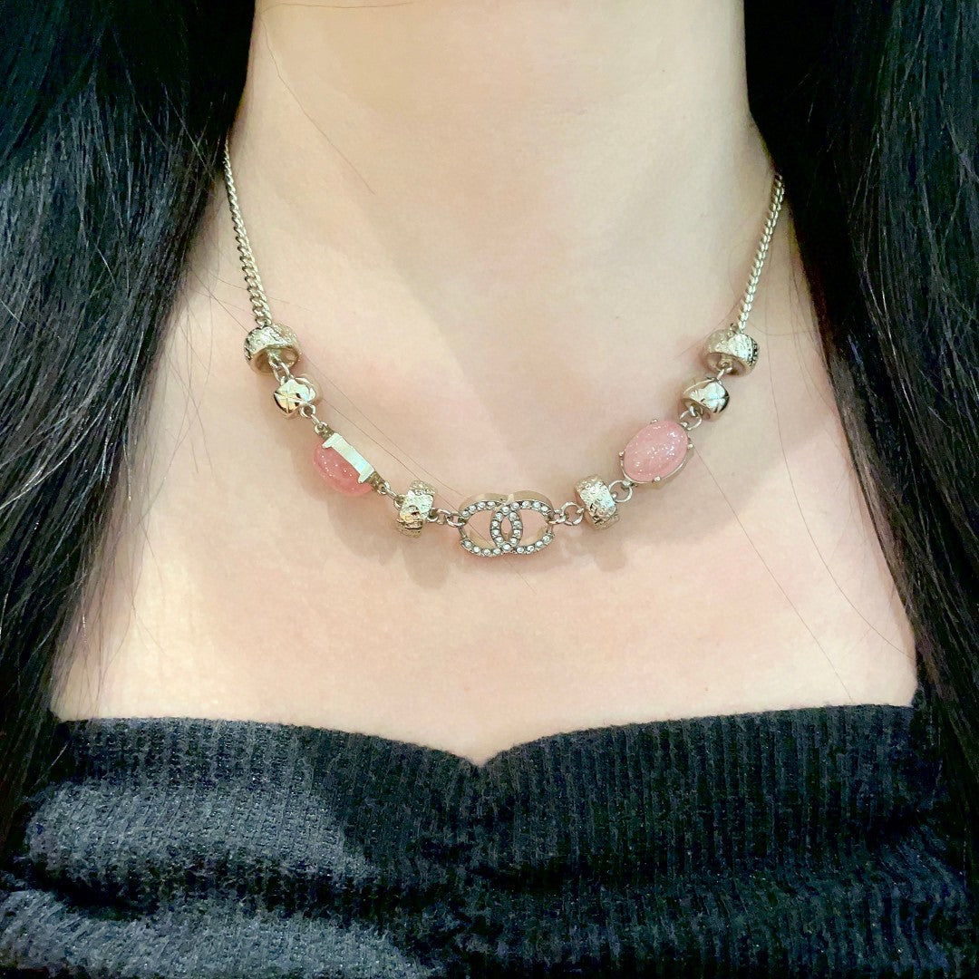 Martin Graham pendant necklace in polished metal-tone – close-up detail