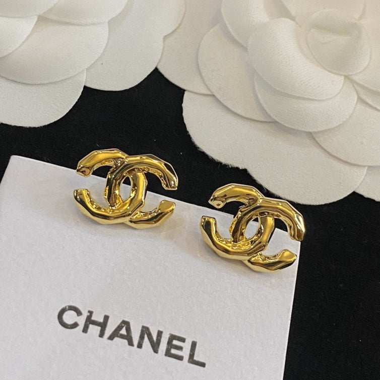 Martin Graham stud earrings in polished metal-tone – main product view