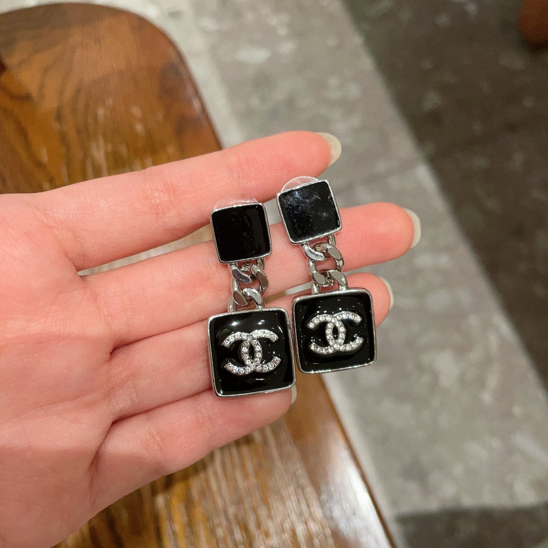 Martin Graham earrings in polished metal-tone – side detail