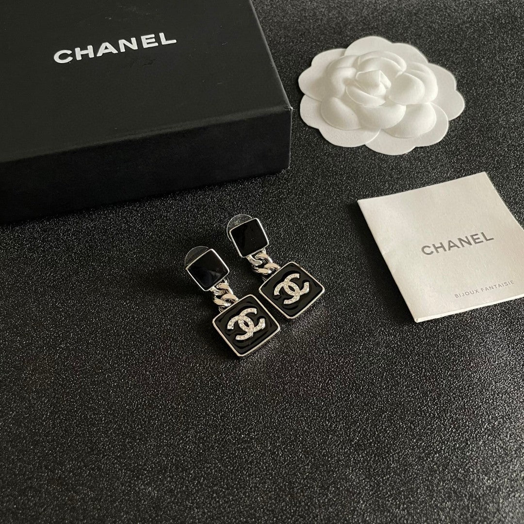 Martin Graham earrings in polished metal-tone – styled product view