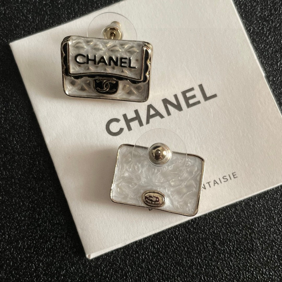 Martin Graham stud earrings in polished metal-tone – main product view