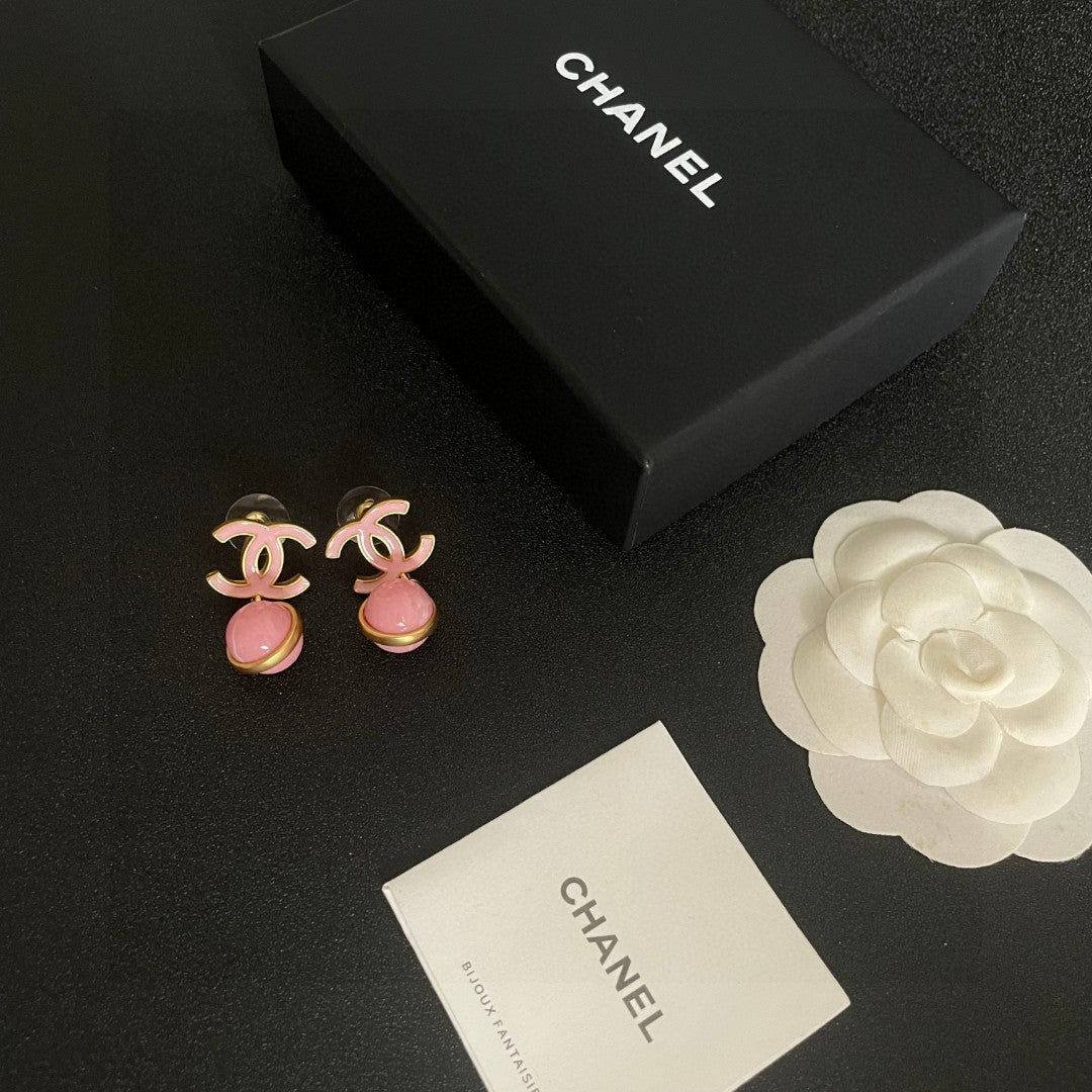 Martin Graham earrings in polished metal-tone – close-up detail