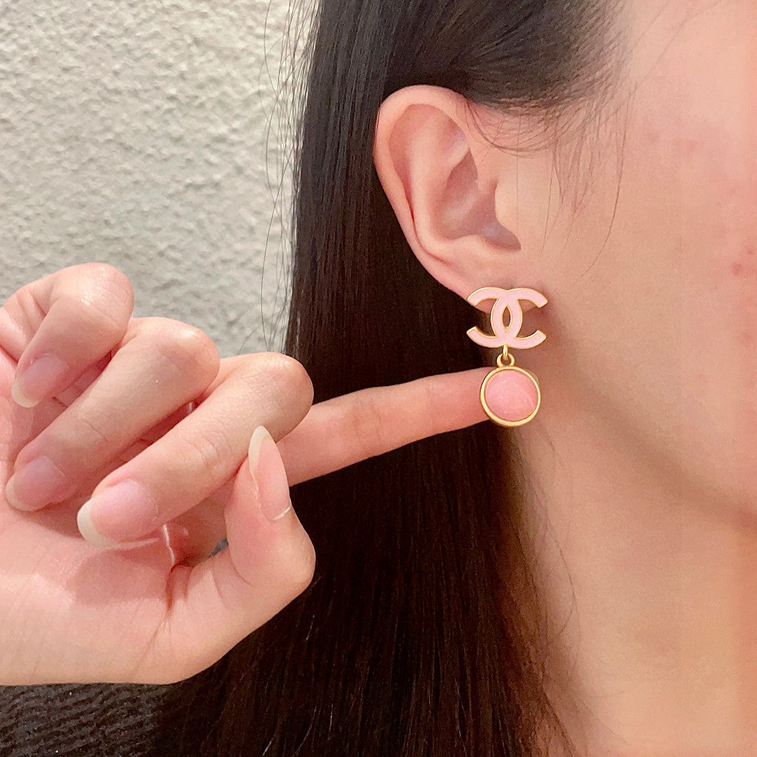 Martin Graham earrings in polished metal-tone – front product view