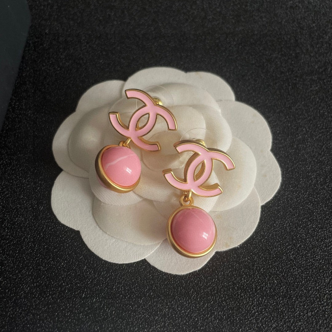 Martin Graham earrings in polished metal-tone – front product view