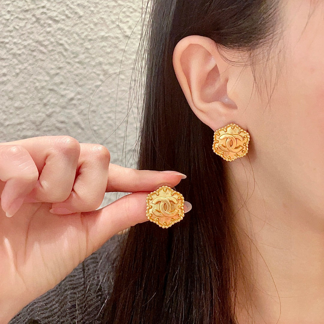 Martin Graham stud earrings in polished metal-tone – main product view