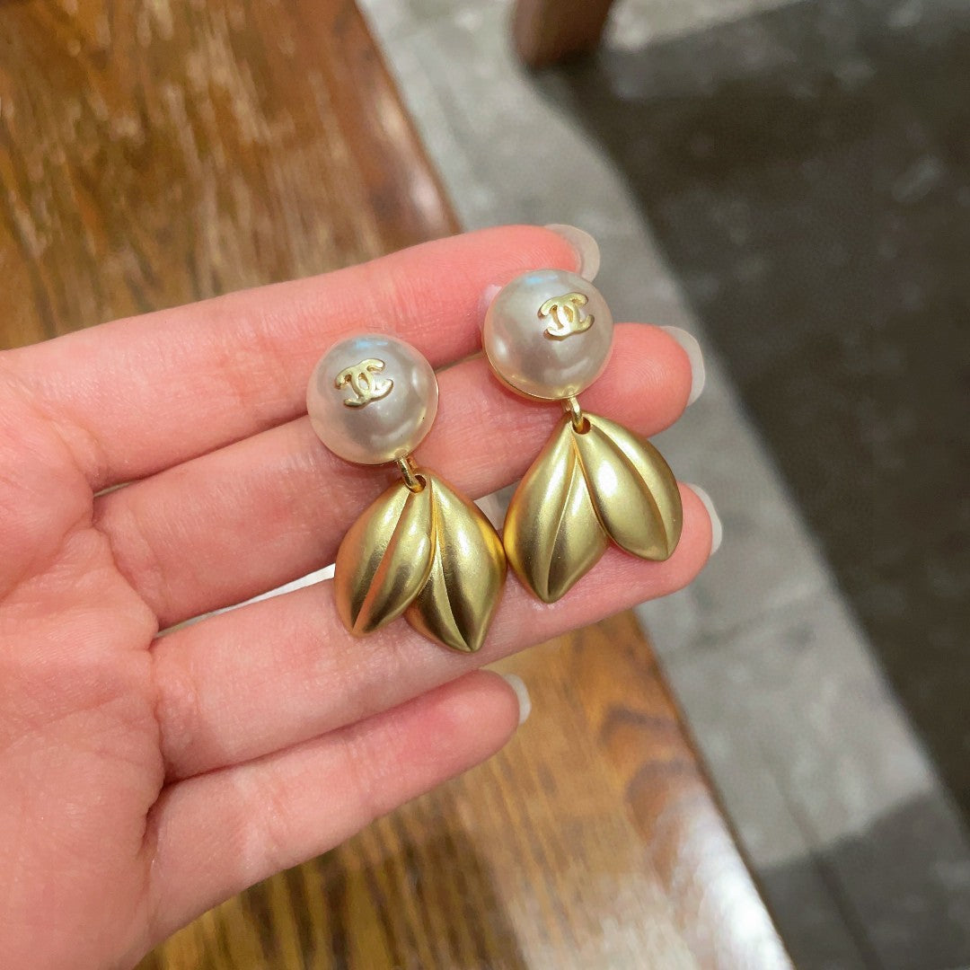 Martin Graham earrings in polished metal-tone – side detail