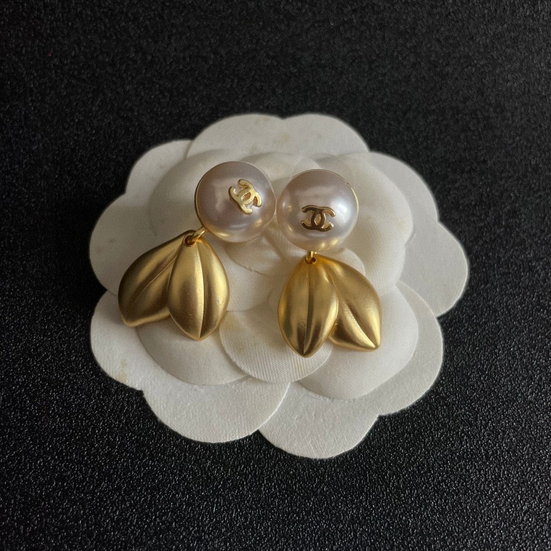 Martin Graham earrings in polished metal-tone – front product view