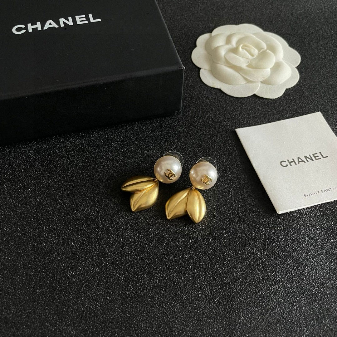 Martin Graham earrings in polished metal-tone – styled product view
