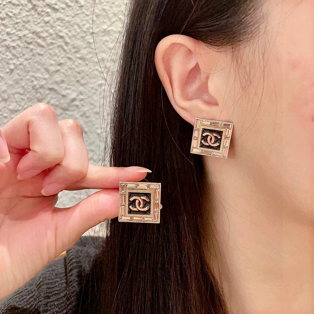 Martin Graham stud earrings in polished metal-tone – main product view