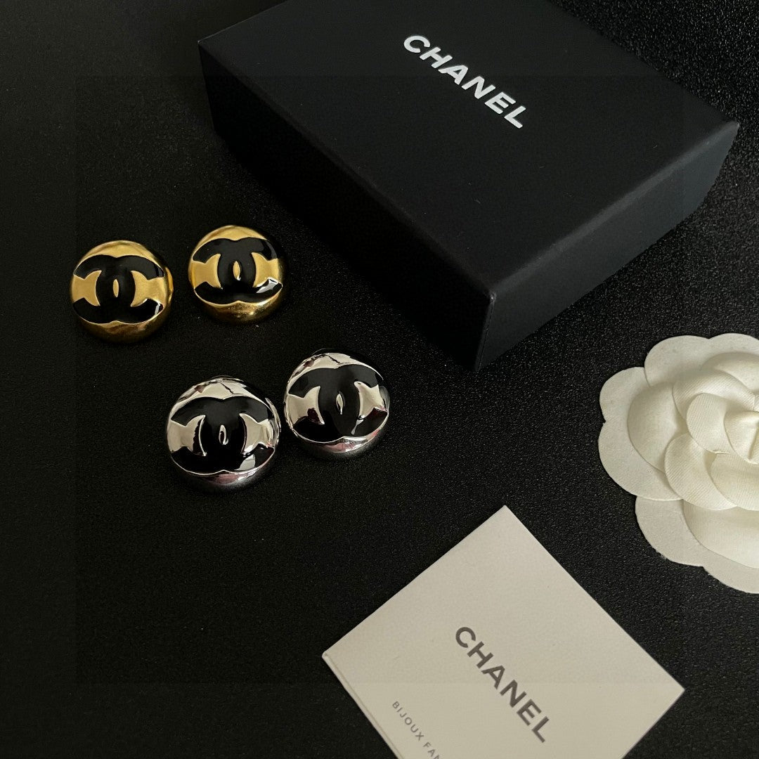 Martin Graham stud earrings in polished metal-tone – side detail