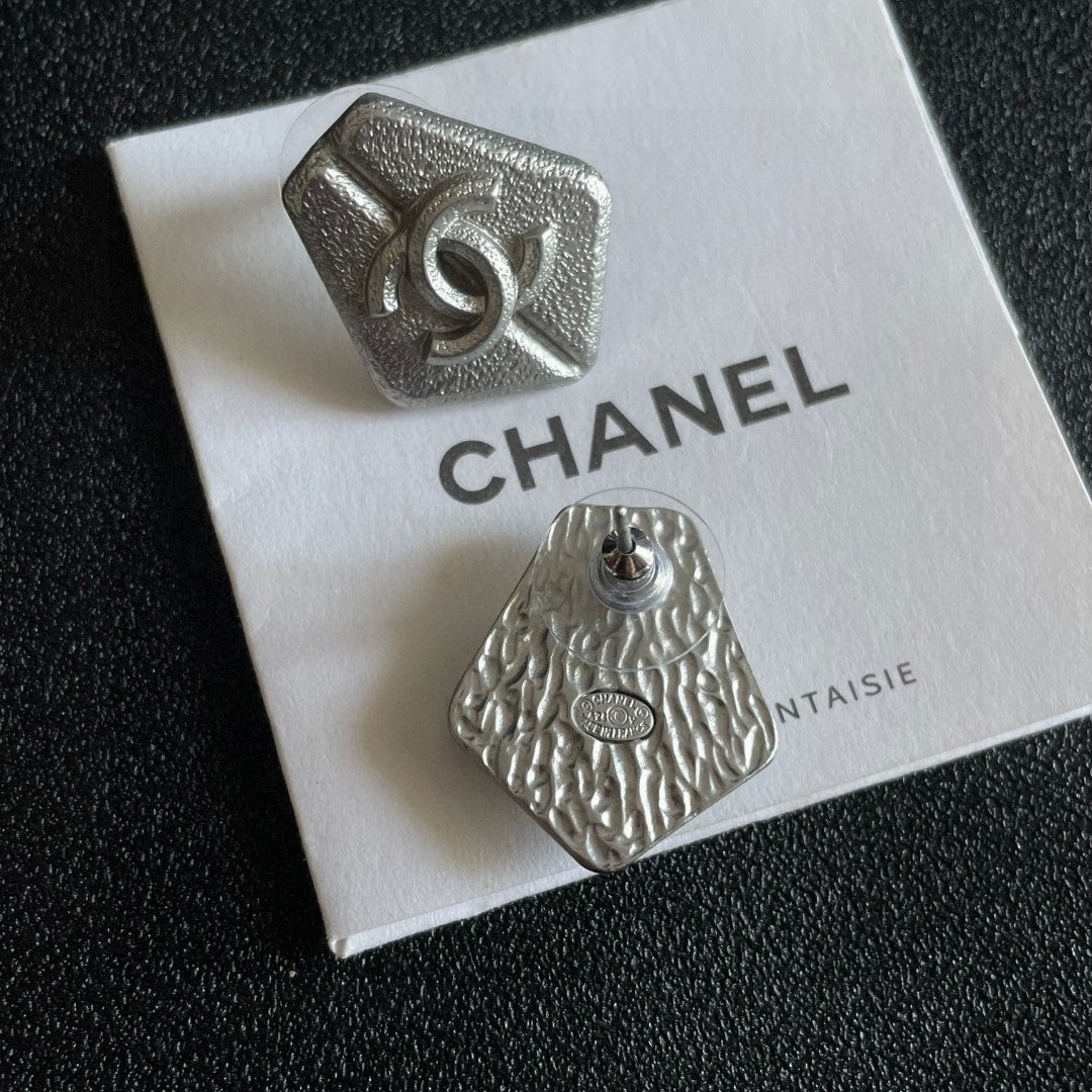 Martin Graham stud earrings in polished metal-tone – main product view