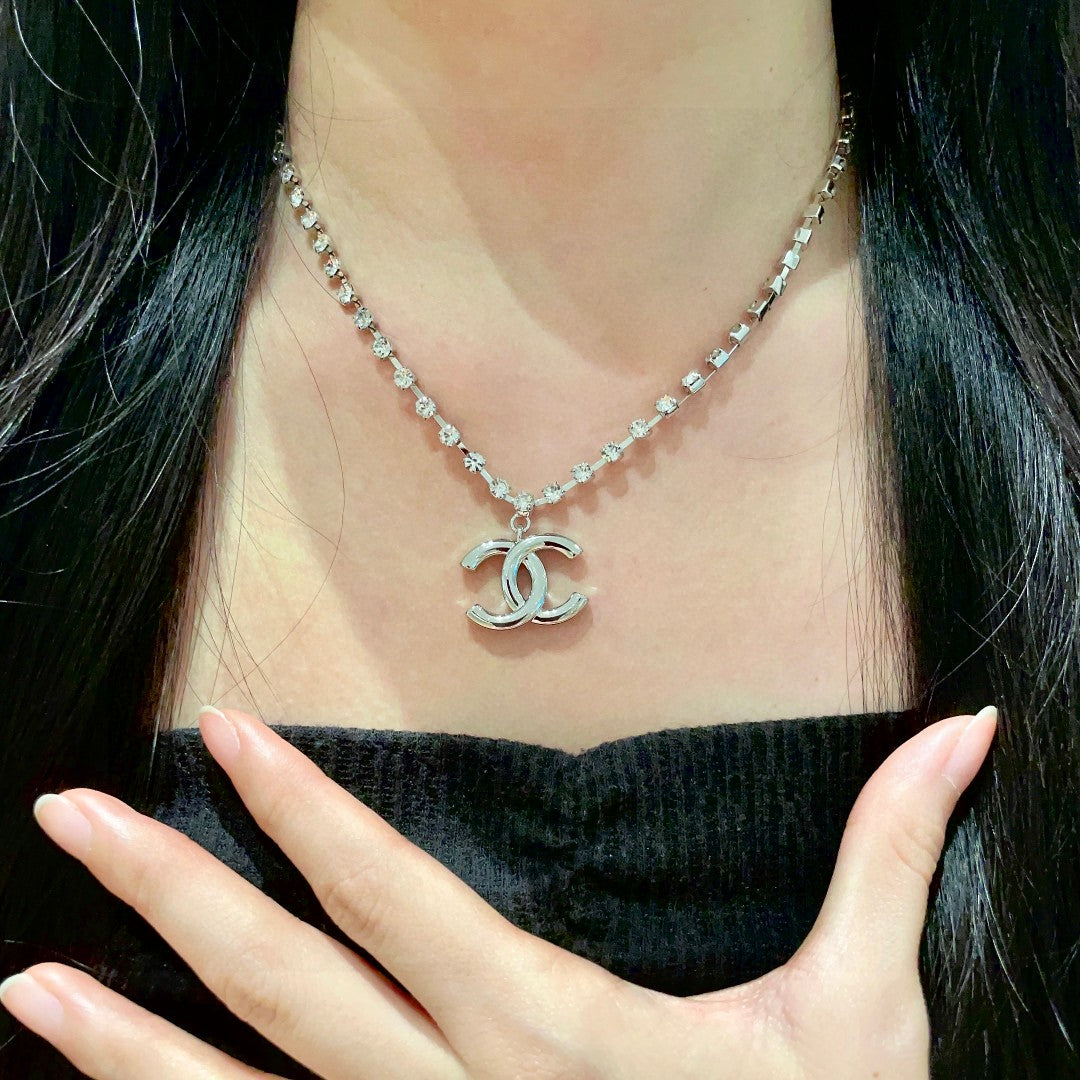 Martin Graham pendant necklace in polished metal-tone – front product view
