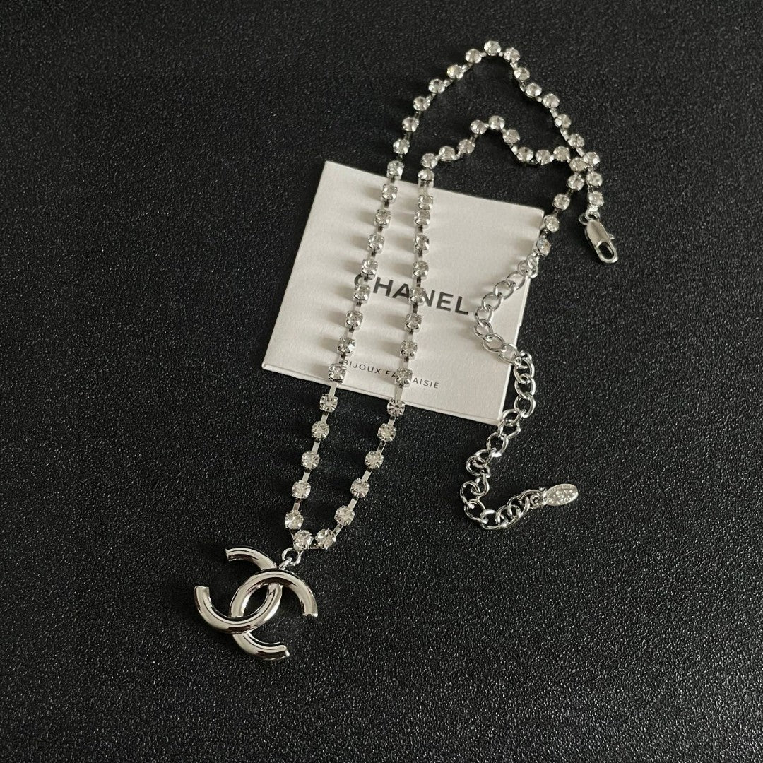 Martin Graham pendant necklace in polished metal-tone – detail view