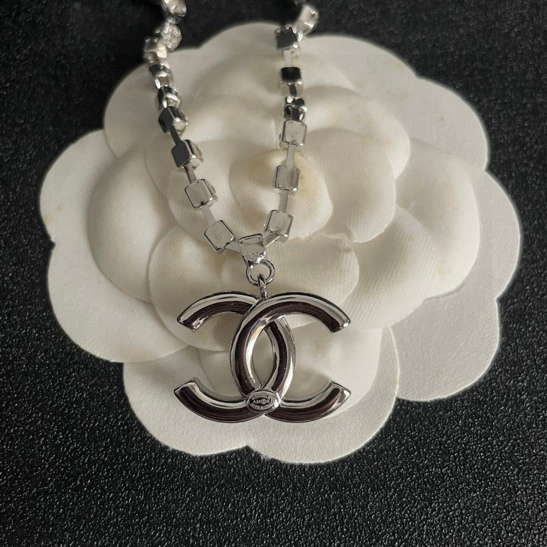 Martin Graham pendant necklace in polished metal-tone – front product view