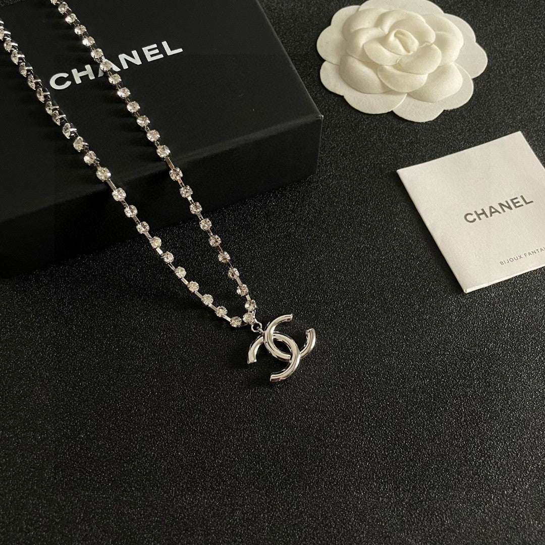 Martin Graham pendant necklace in polished metal-tone – styled product view