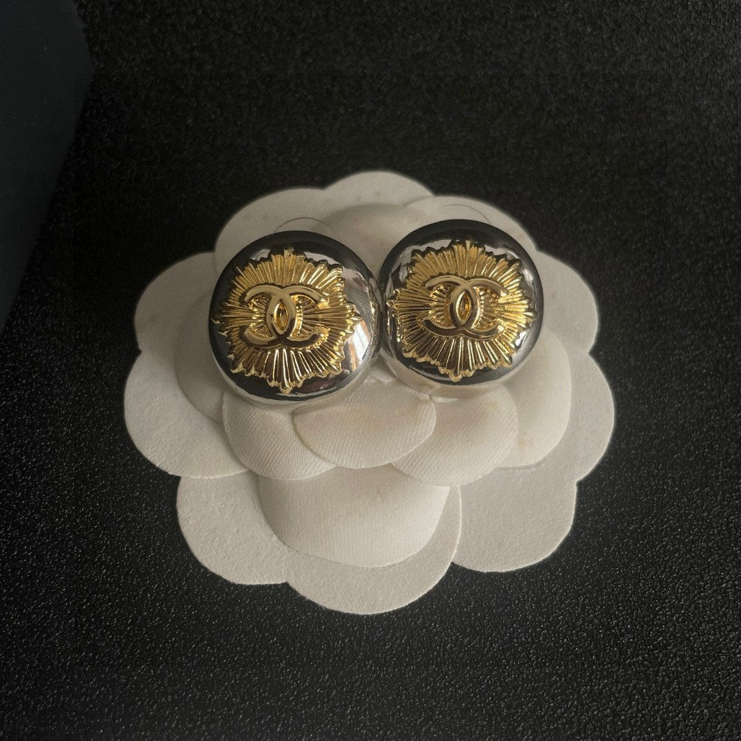 Martin Graham stud earrings in polished metal-tone – front product view