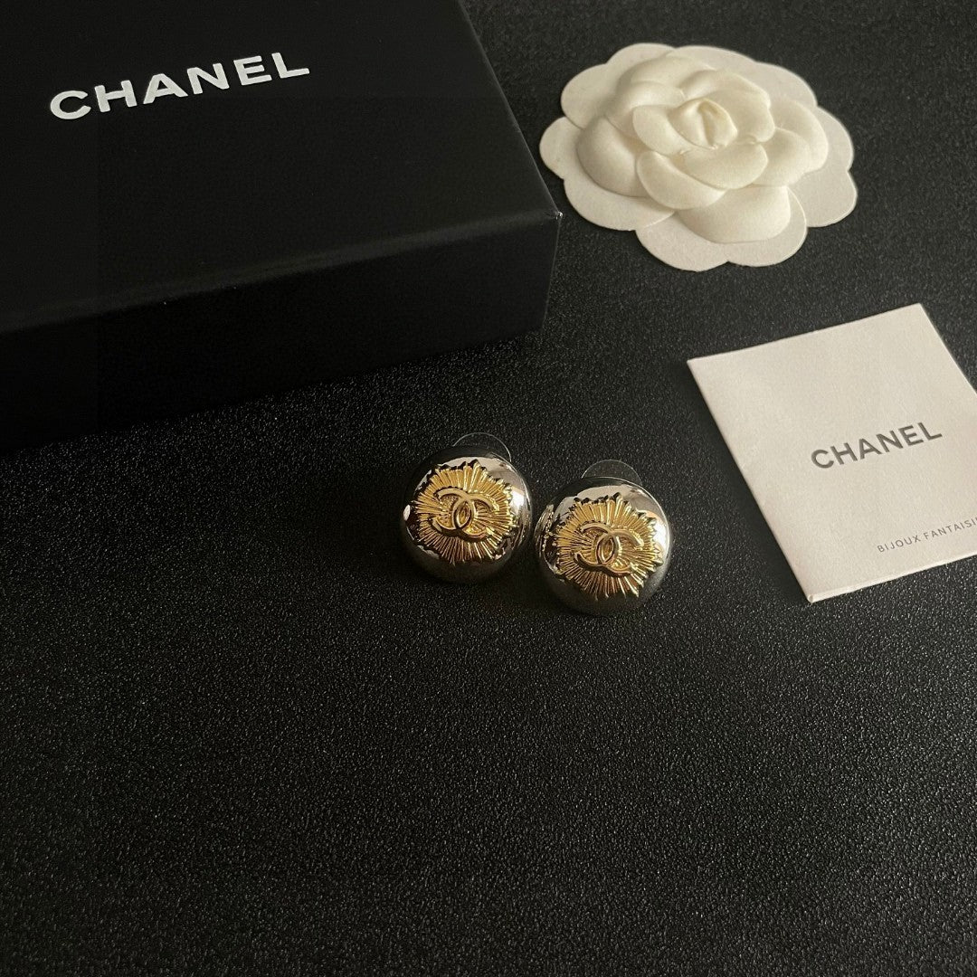 Martin Graham stud earrings in polished metal-tone – styled product view