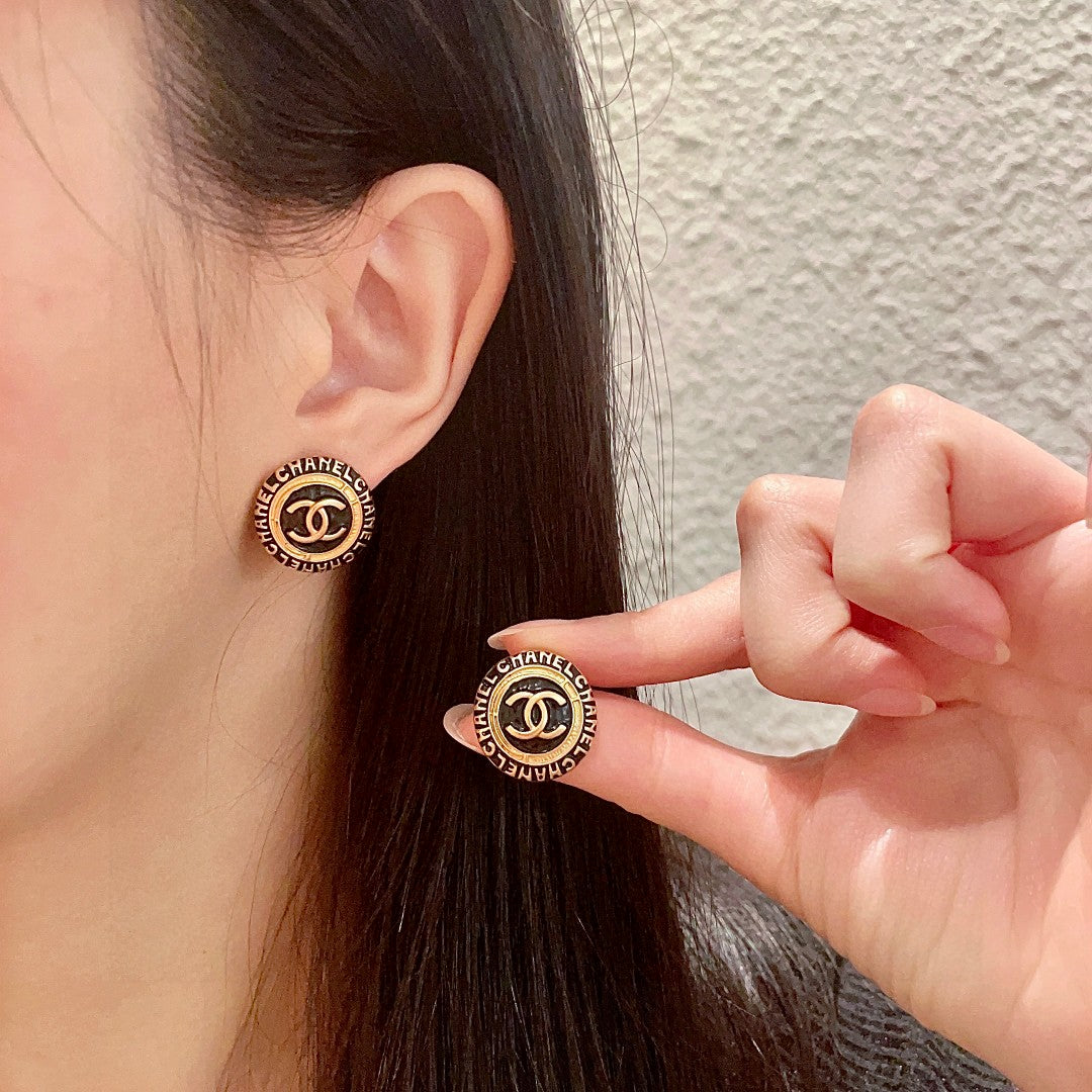Martin Graham stud earrings in polished metal-tone – main product view