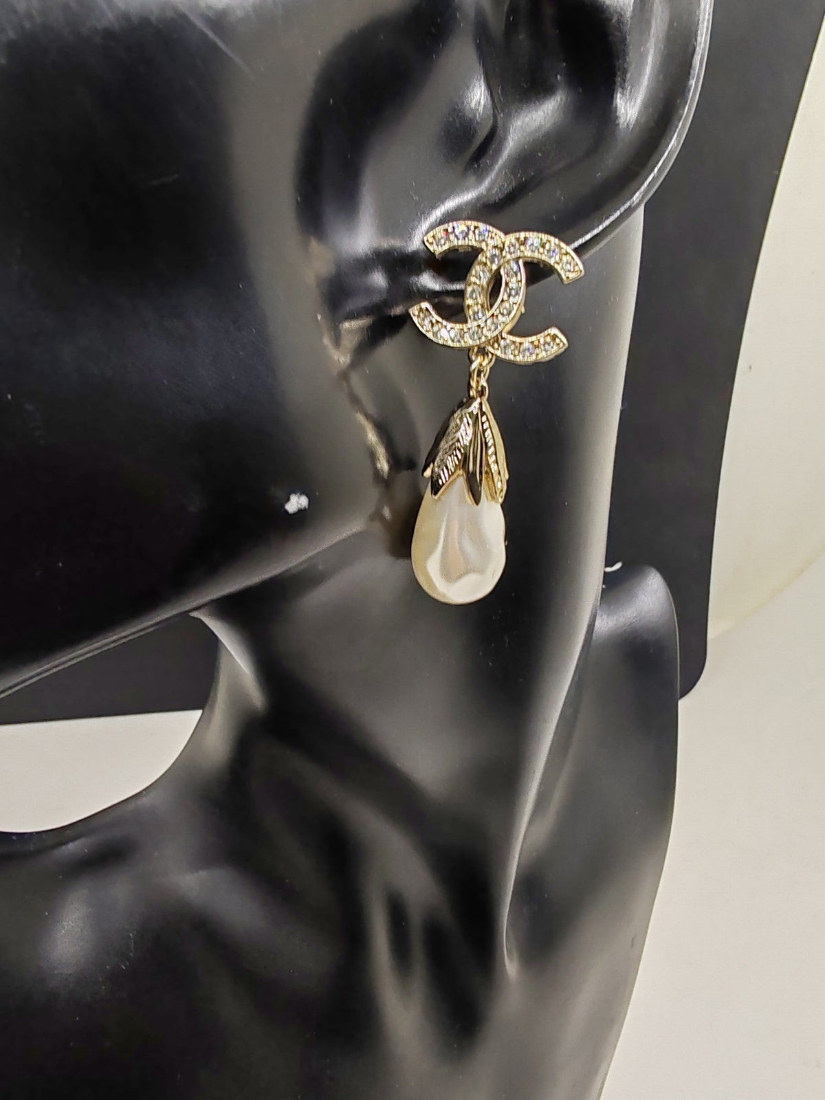 Martin Graham earrings in polished metal-tone – front product view