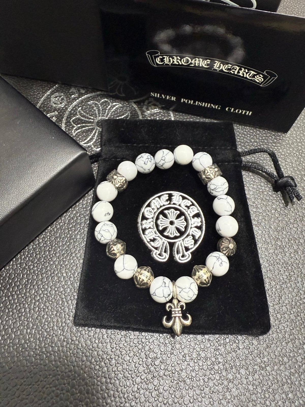 Martin Graham jewelry accessory in polished metal-tone – front product view