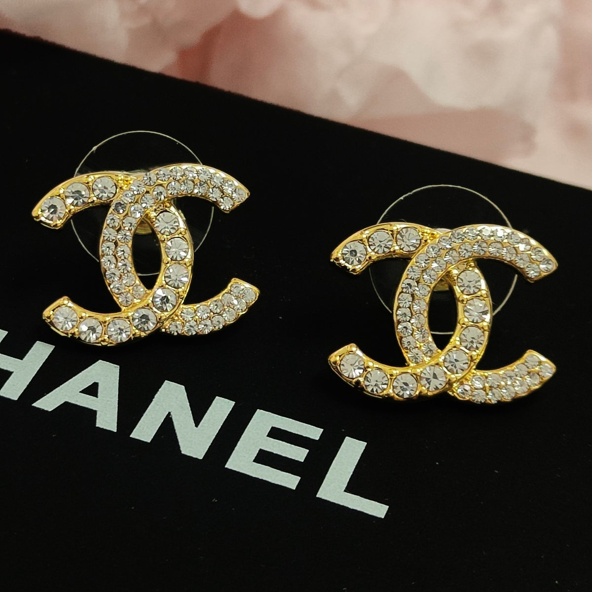 Martin Graham stud earrings in polished metal-tone – styled product view