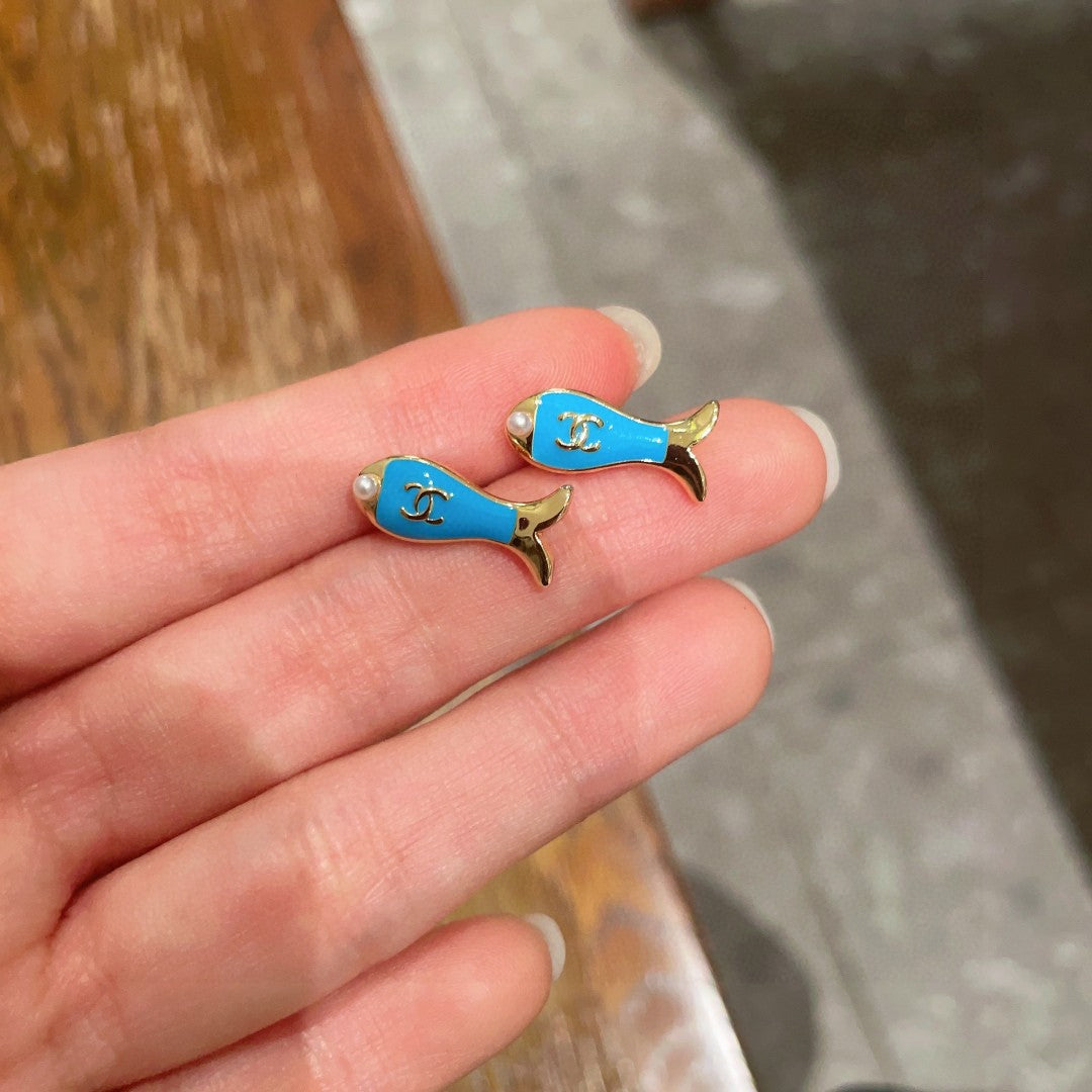 Martin Graham stud earrings in polished metal-tone – side detail
