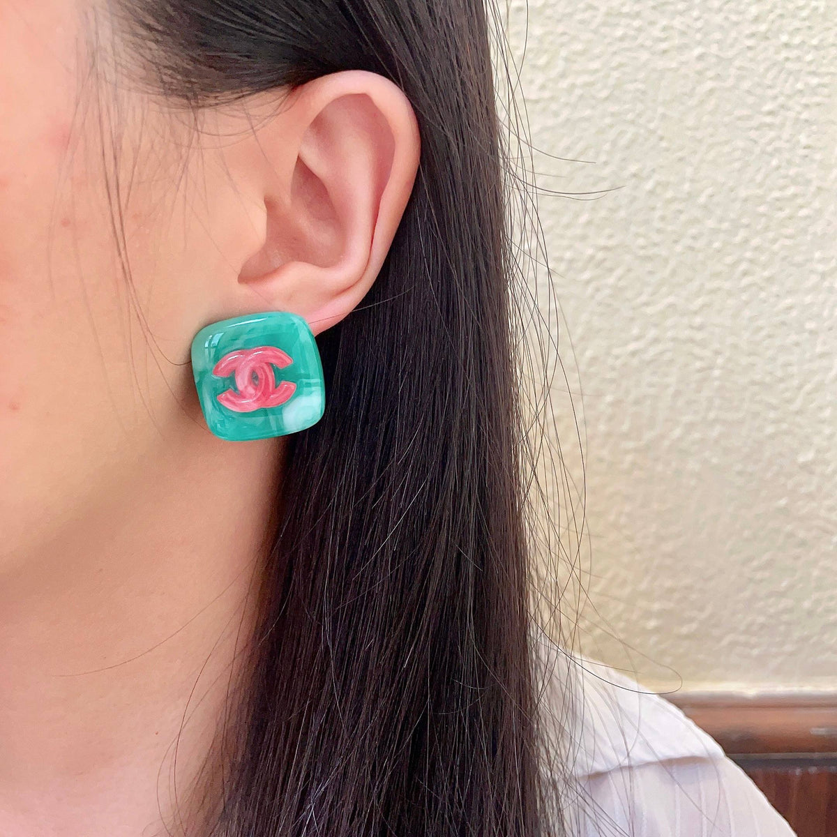 Martin Graham stud earrings in polished metal-tone – detail view
