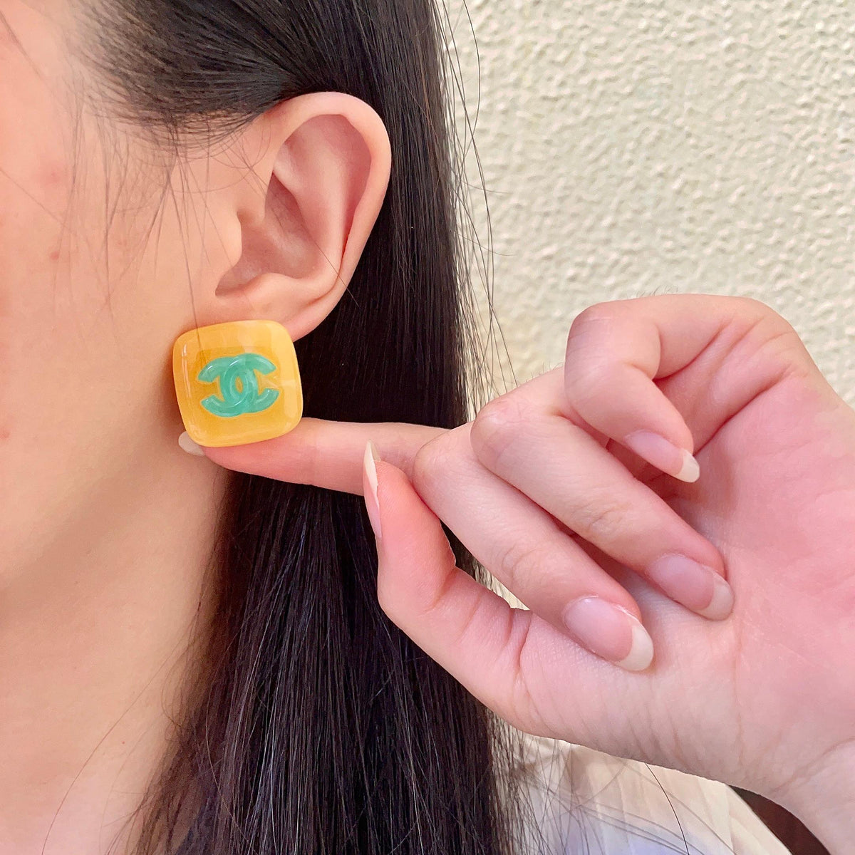 Martin Graham stud earrings in polished metal-tone – front product view