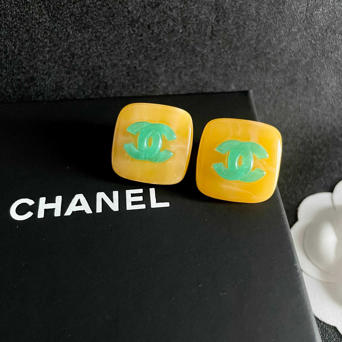 Martin Graham stud earrings in polished metal-tone – detail view