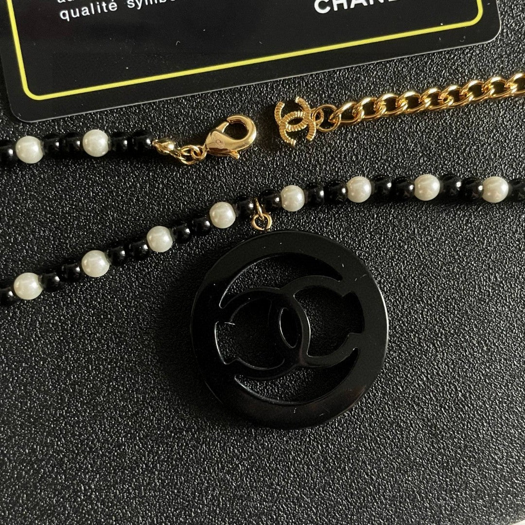 Martin Graham pendant necklace in polished metal-tone – main product view