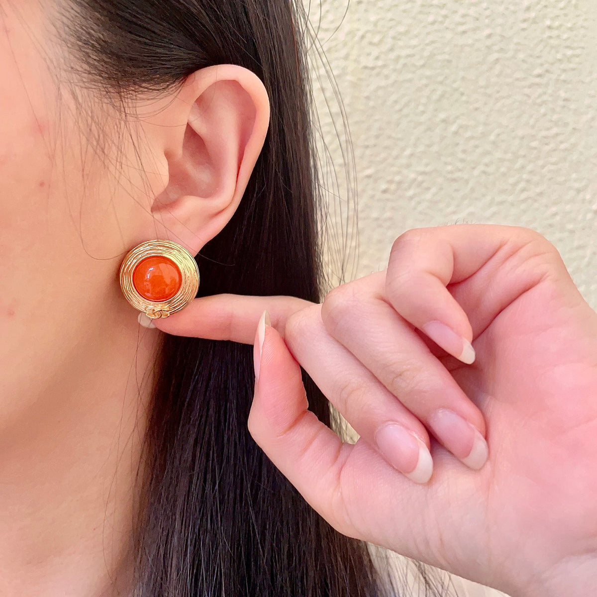 Martin Graham stud earrings in polished metal-tone – front product view