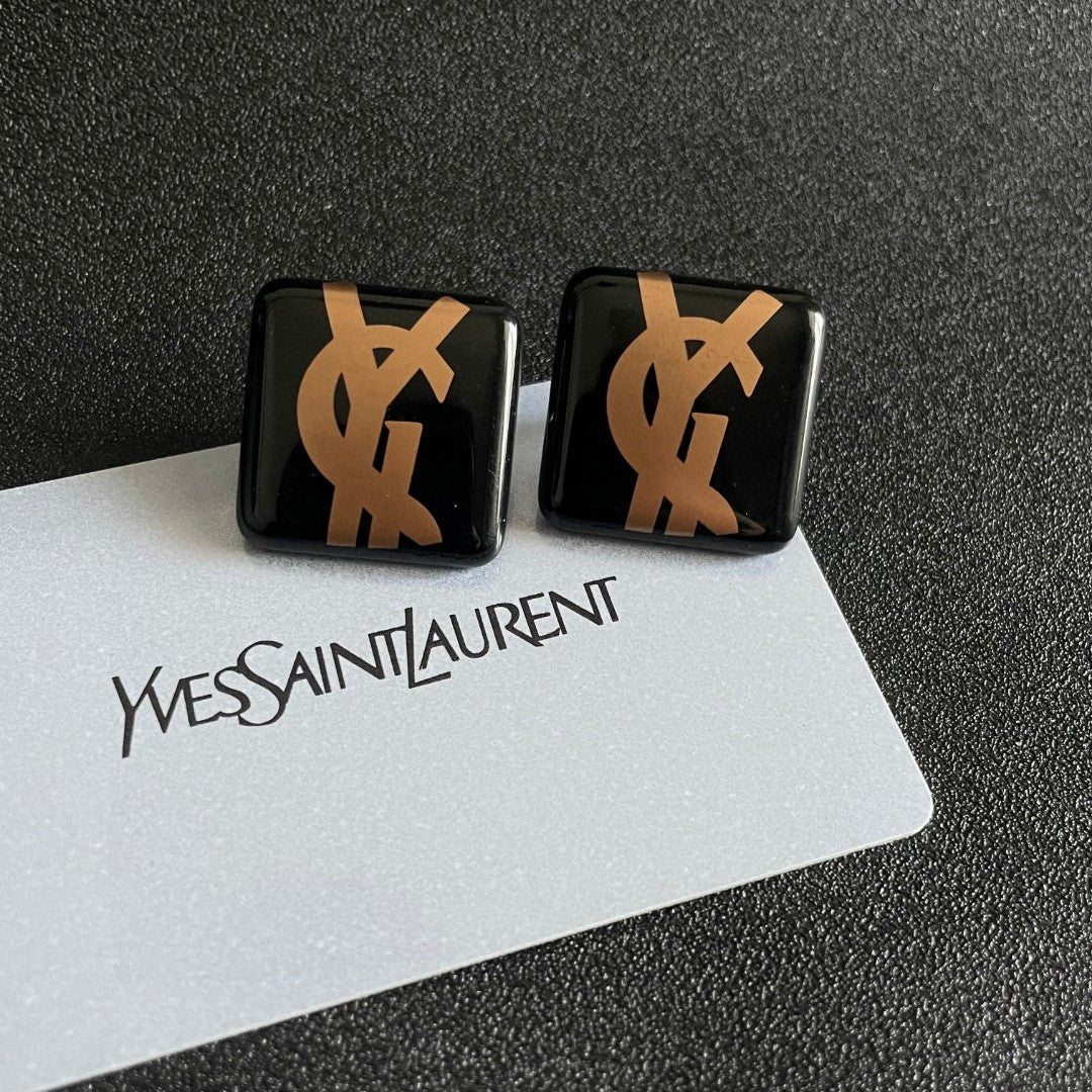 Martin Graham stud earrings in polished metal-tone – front product view