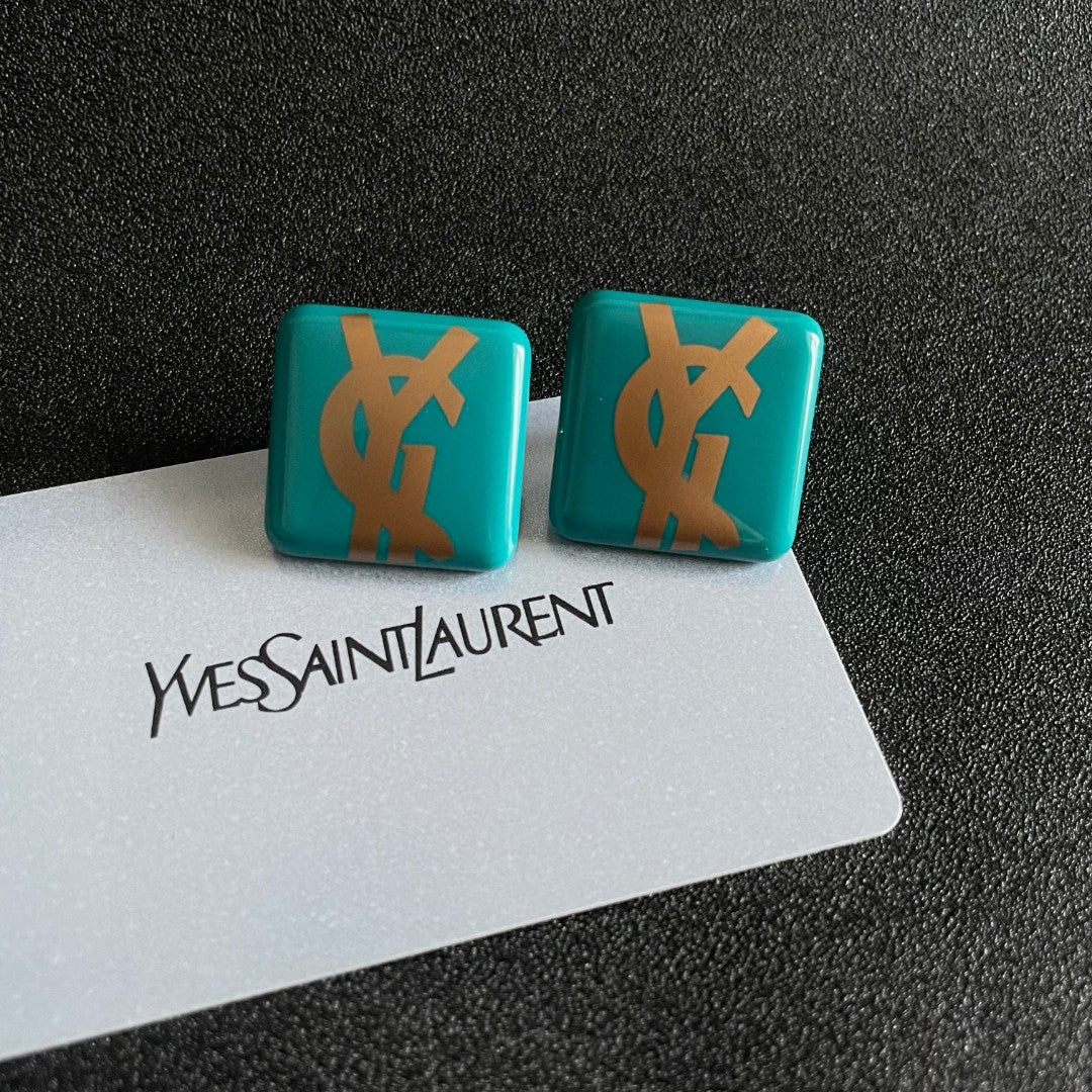 Martin Graham stud earrings in polished metal-tone – front product view