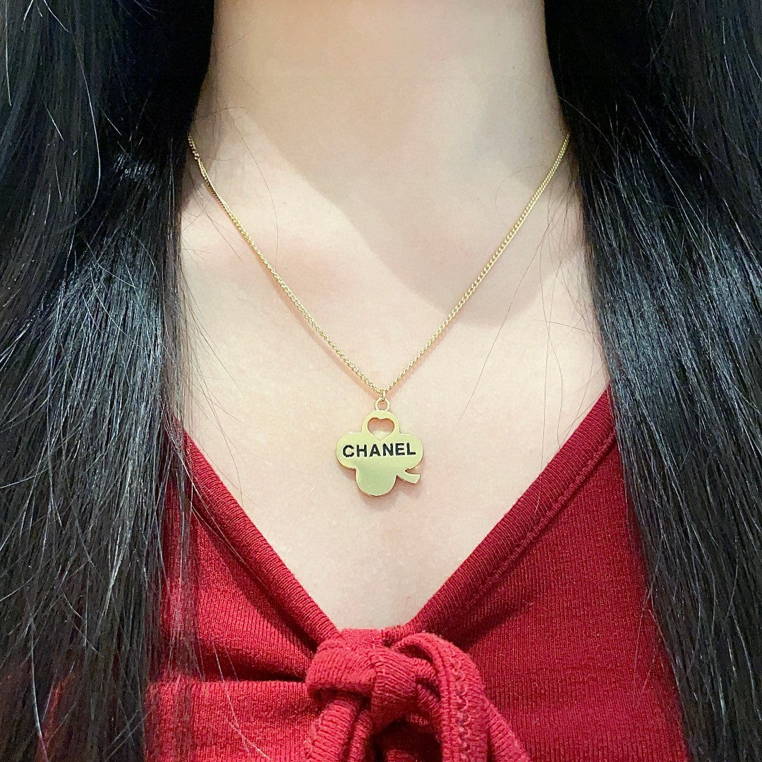 Martin Graham pendant necklace in polished metal-tone – detail view