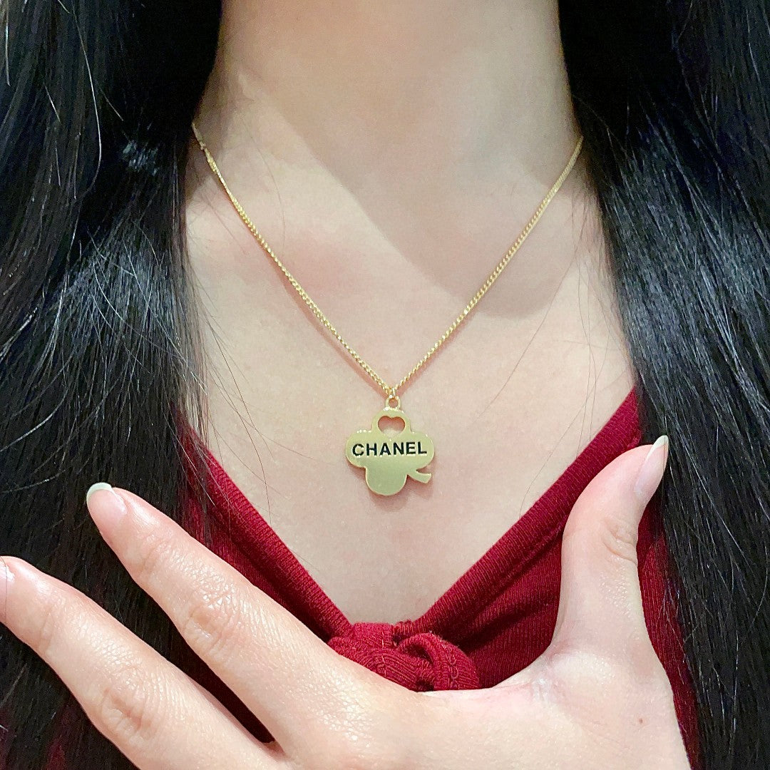 Martin Graham pendant necklace in polished metal-tone – front product view