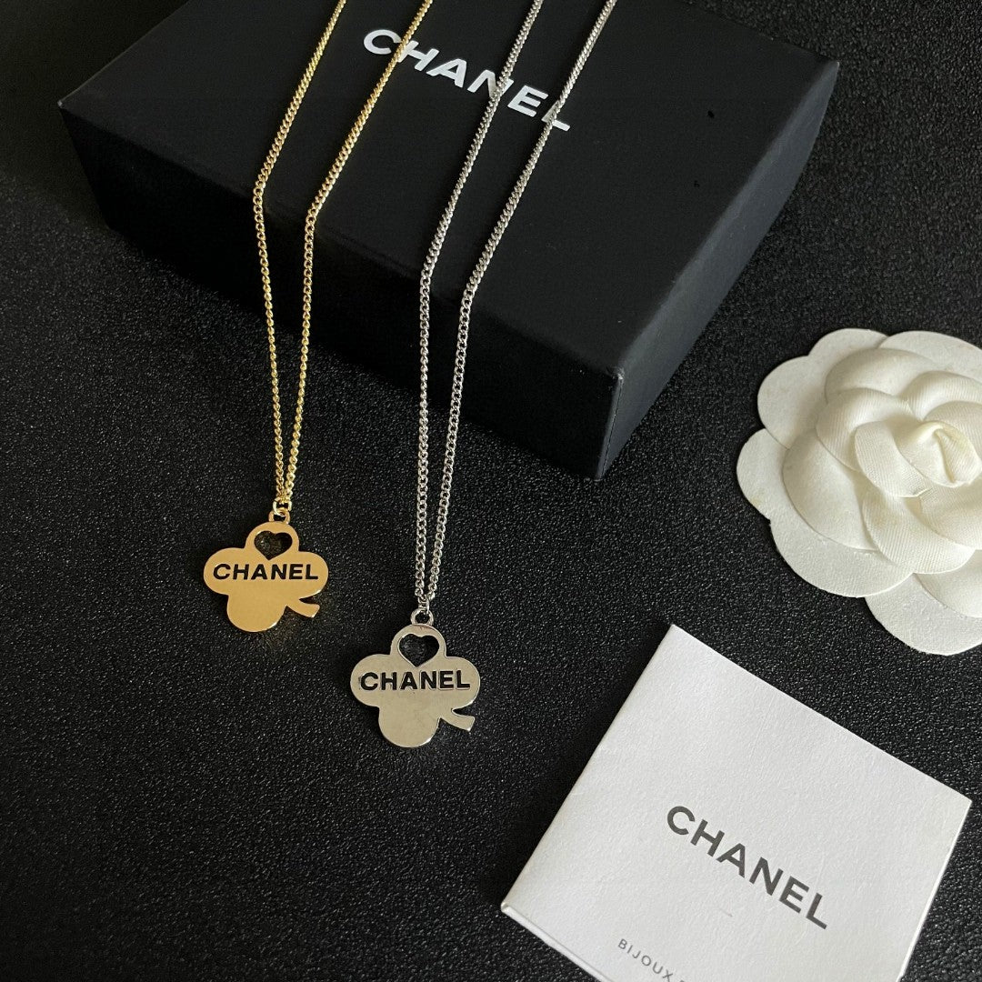 Martin Graham pendant necklace in polished metal-tone – close-up detail