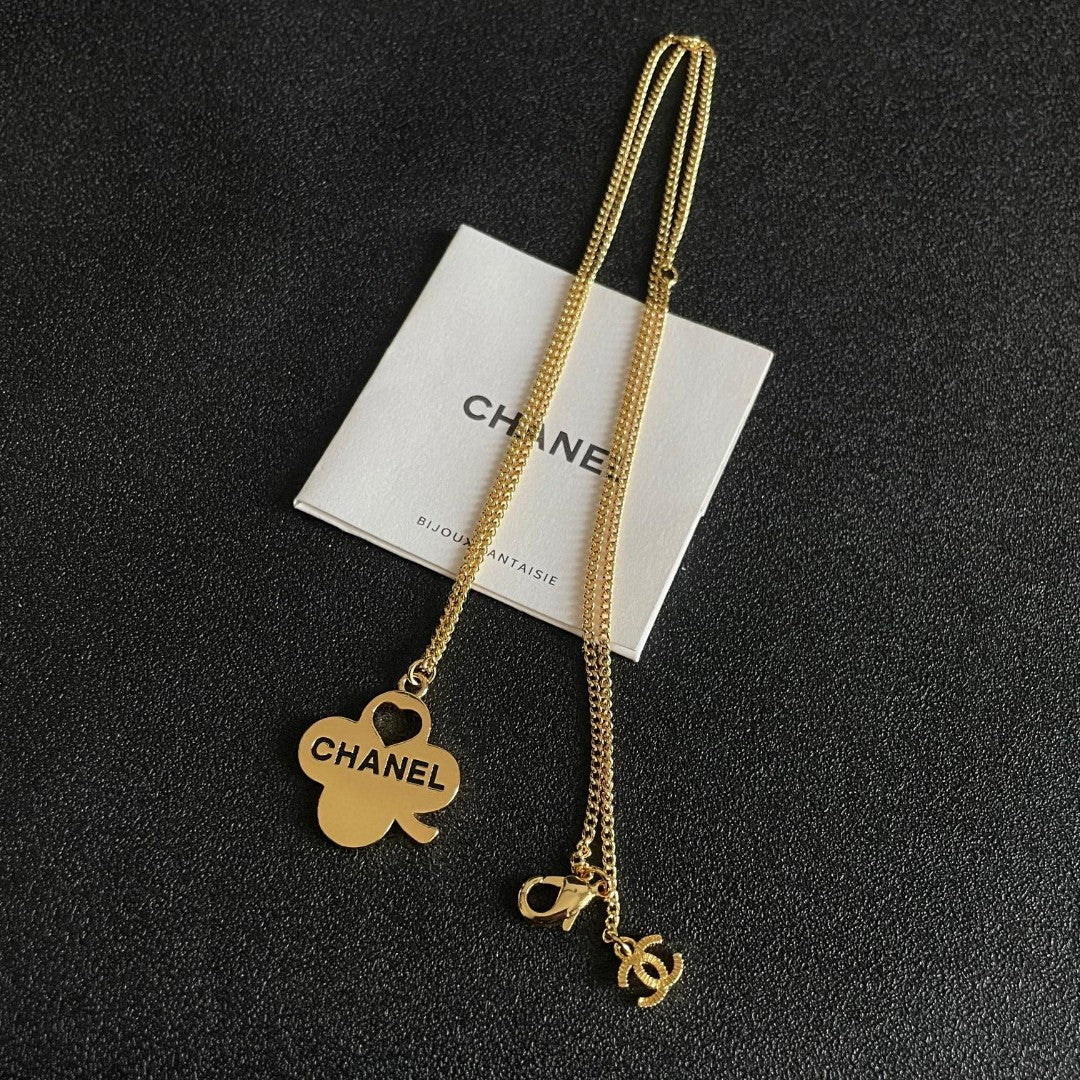 Martin Graham pendant necklace in polished metal-tone – detail view