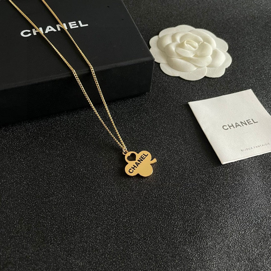 Martin Graham pendant necklace in polished metal-tone – styled product view
