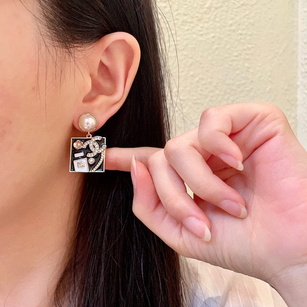 Martin Graham earrings in polished metal-tone – front product view